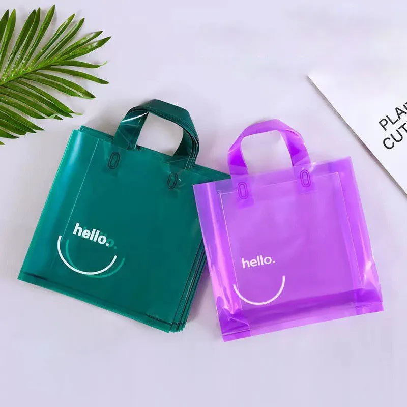 High quality thick clear transparent plastic packaging bag for clothes shopping smile bags with logos