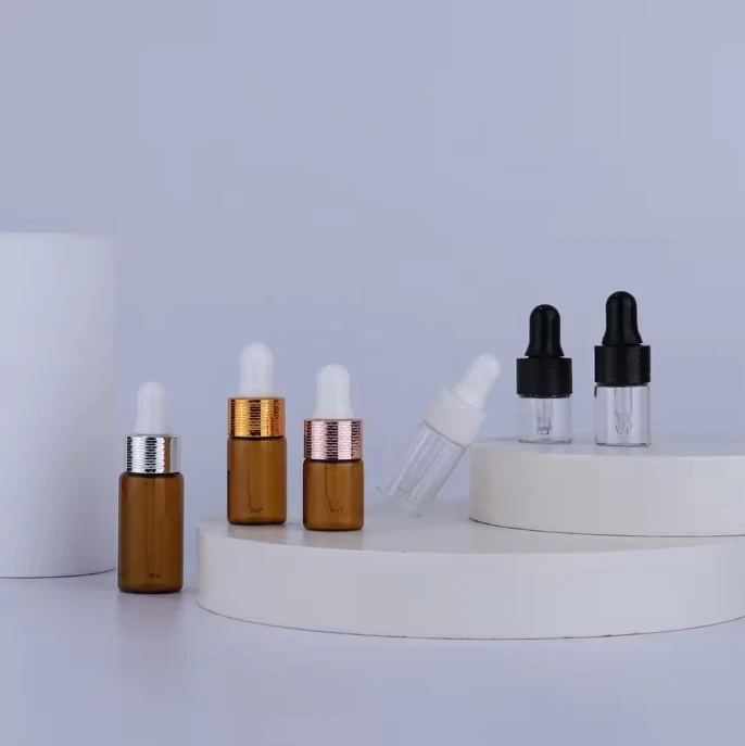 Wholesale Customizable 1ml 2ml 3ml 5ml 10ml Clear Essence Oil Mini Dropper Glass Vials Bottle With Gold Silver Press Dropper