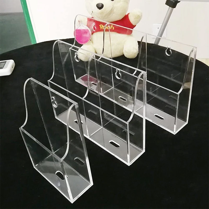 Custom high quality acrylic wall mounted mobile phone iPad charging stand Multimedia Remote Control Display Stand