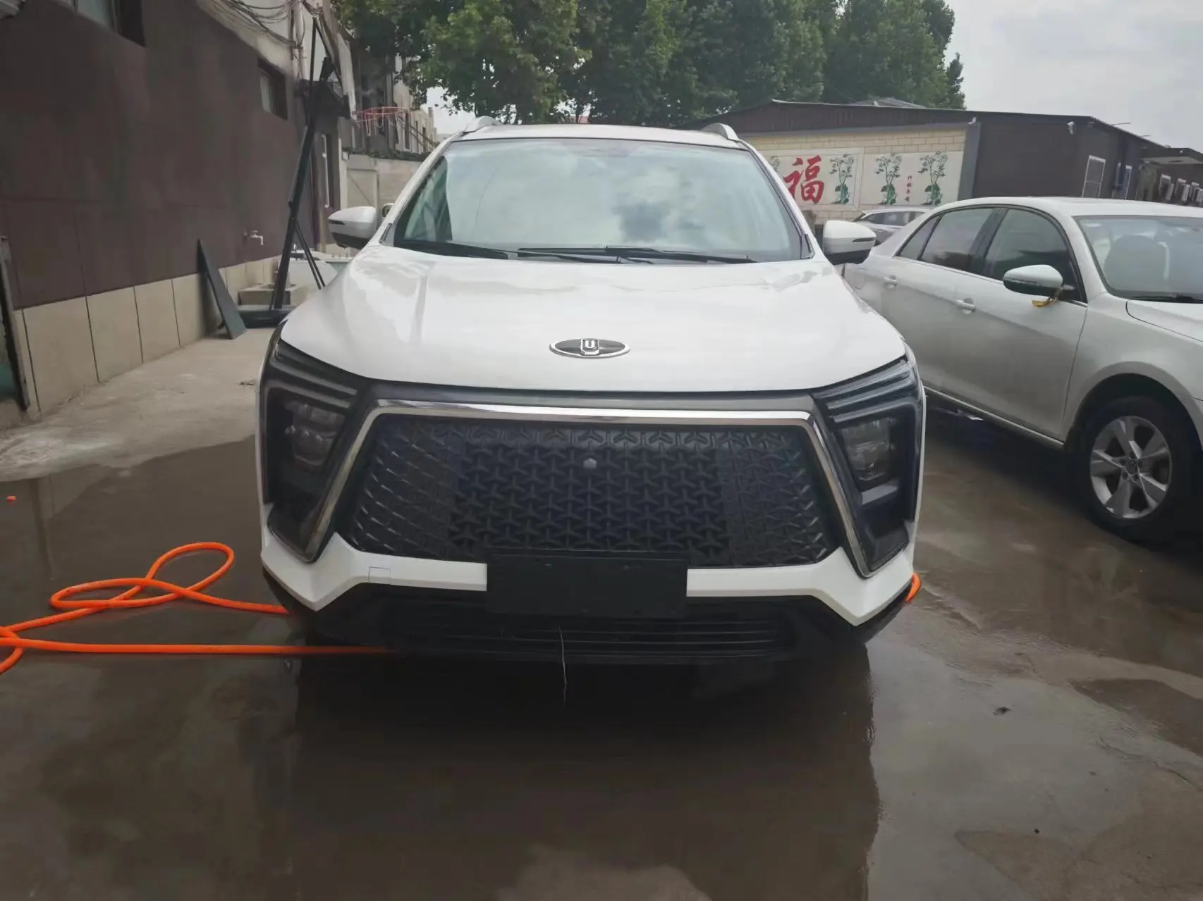 2022 SUV Stock Car with Hydraulic Steering System Left Hand Drive Fabric Seats Metal Roof Rack Good Price for Adults