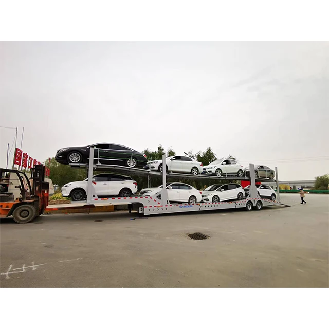 The hydraulic double steel chassis SAF axle trailer made in China is used to transport 10 new energy vehicles
