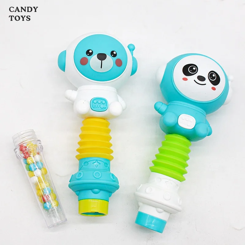 Hot Selling children lovely cartoon shaky  spaceman HALAL FDA candy and toys for boys and girls