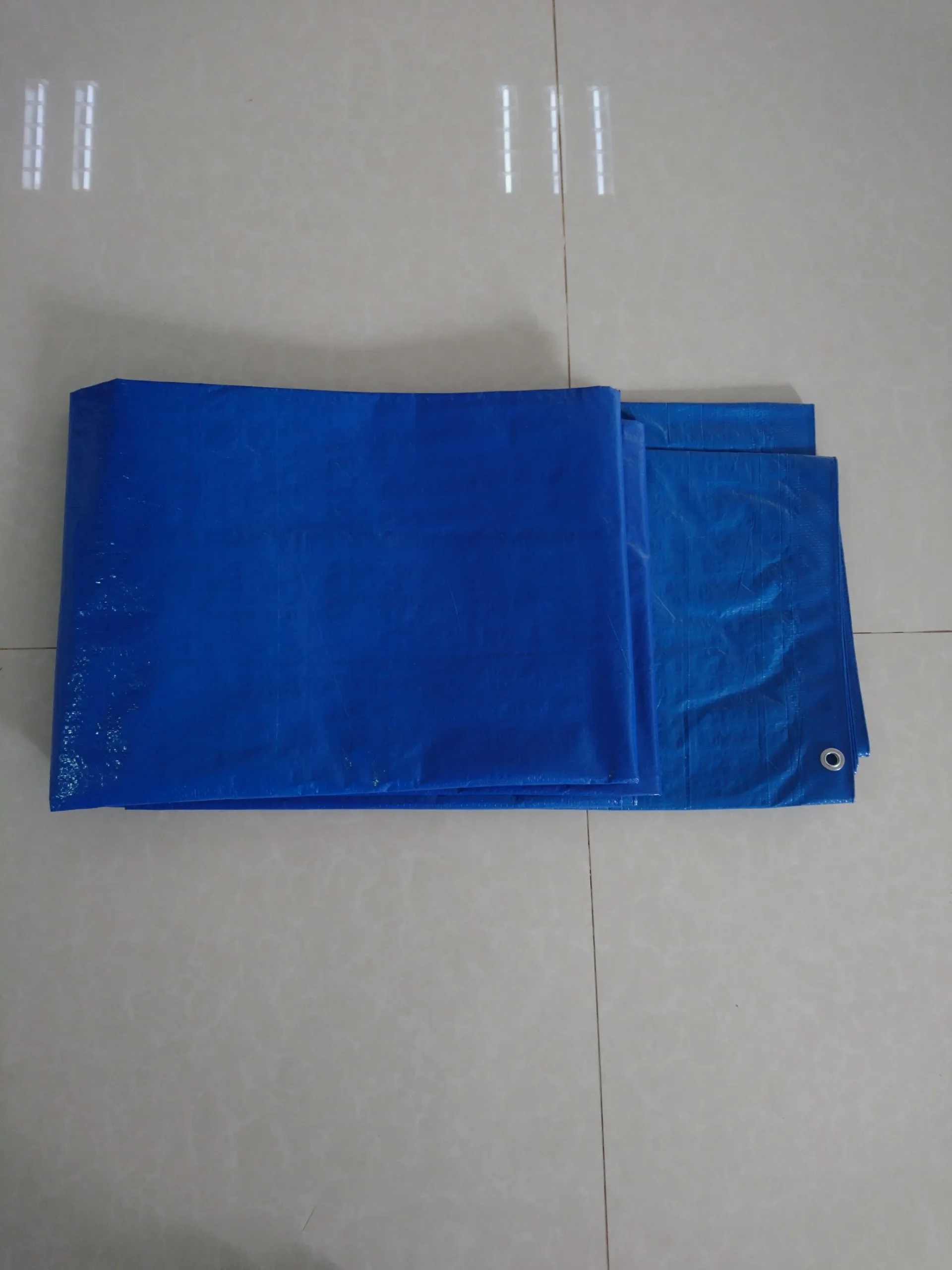
PE Tarpaulin Sheet With Sides Heat Sealed and Aluminium Eyelets 