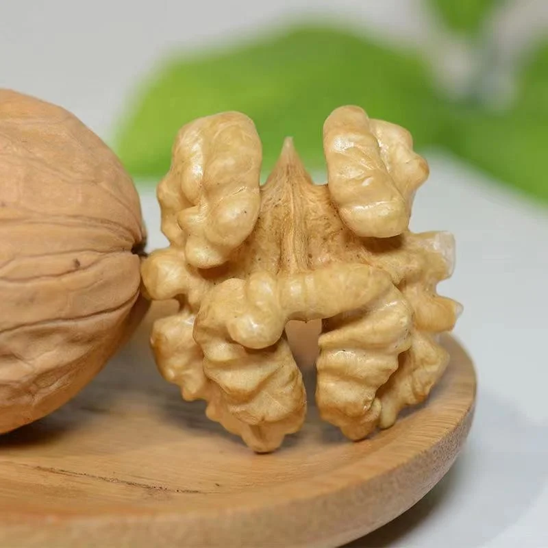 Sell First-class Quality Cheap Halved Walnuts,walnut Kernels,walnuts without Shells Amber Cheap Price Pp Raw Material Top Grade