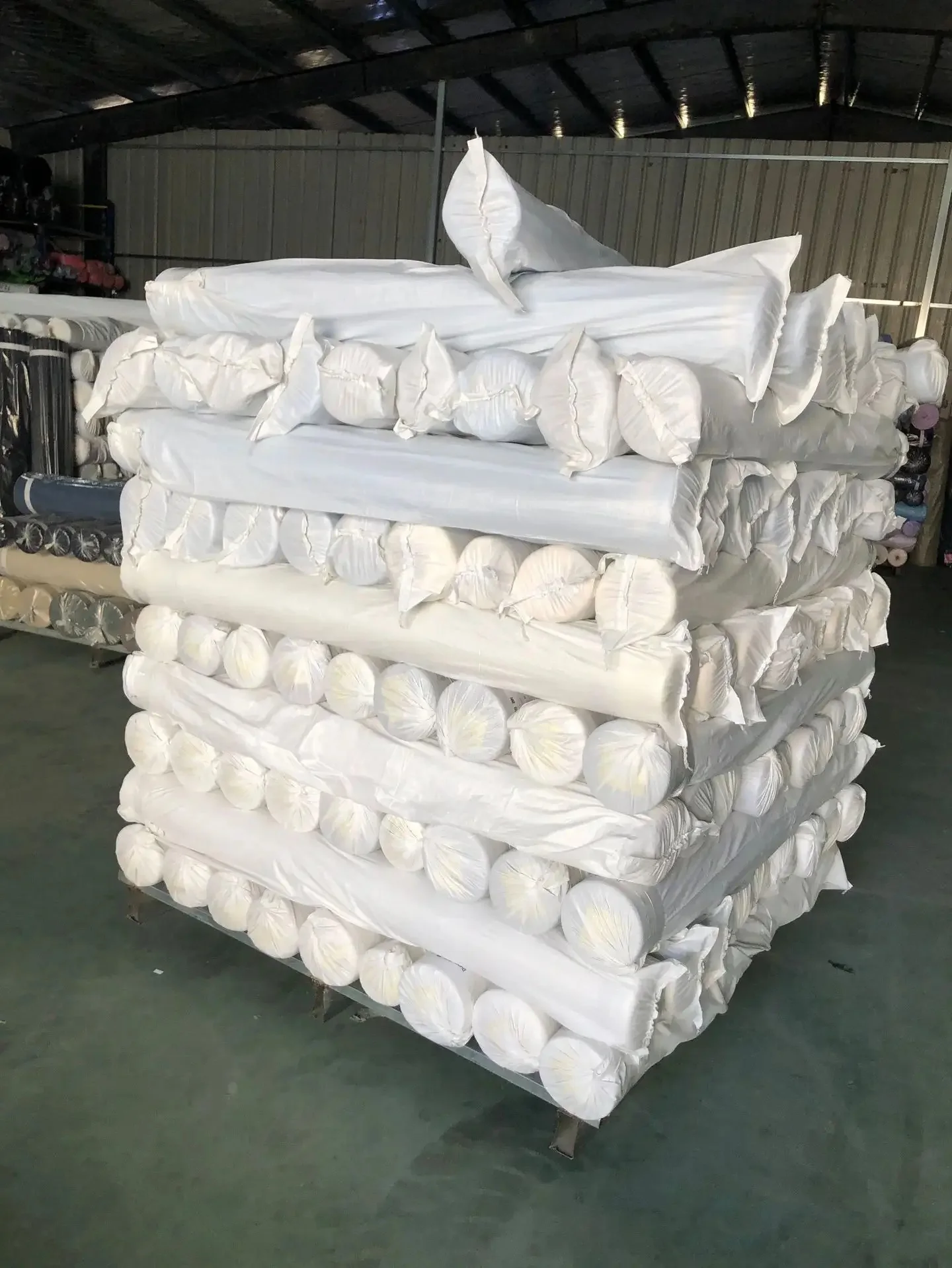 Wholesale solid 100% polyester dyed plain woven microfiber fabric roll packing