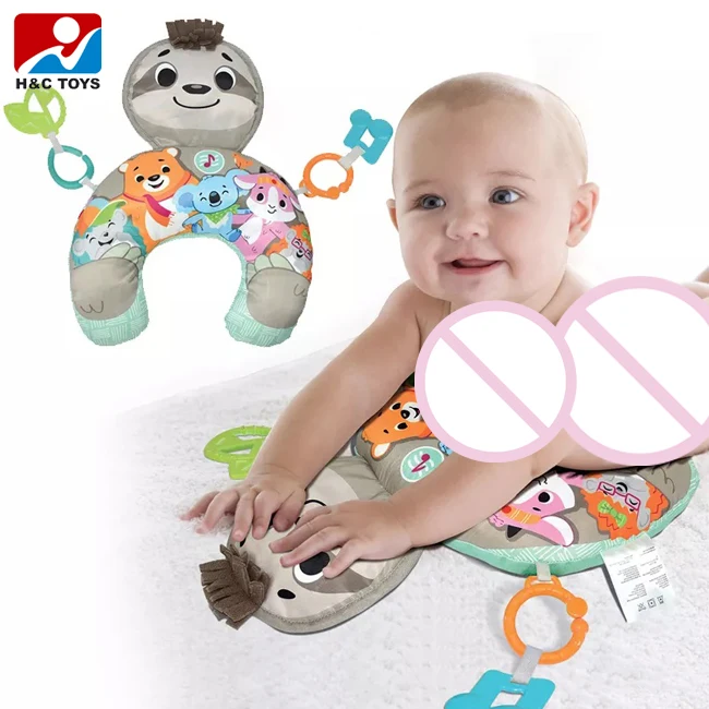 Comfortable soft cartoon animal game lie down pillow toy with rattle baby pillow u shape