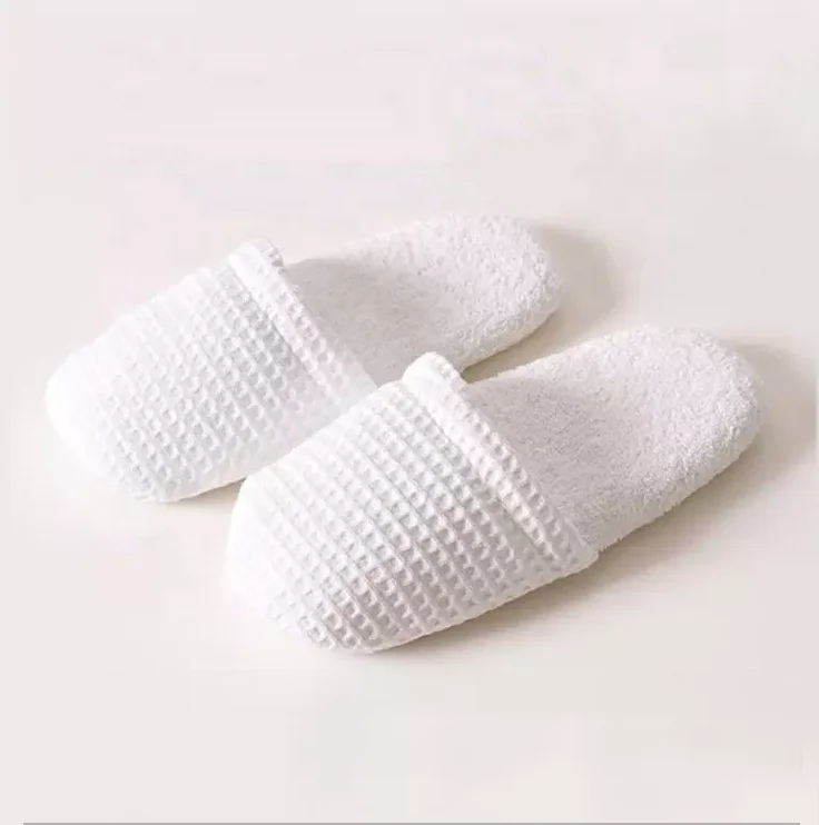 Factory sale cheap prices safety and environmental protection customized white waffle disposable hotel slippers
