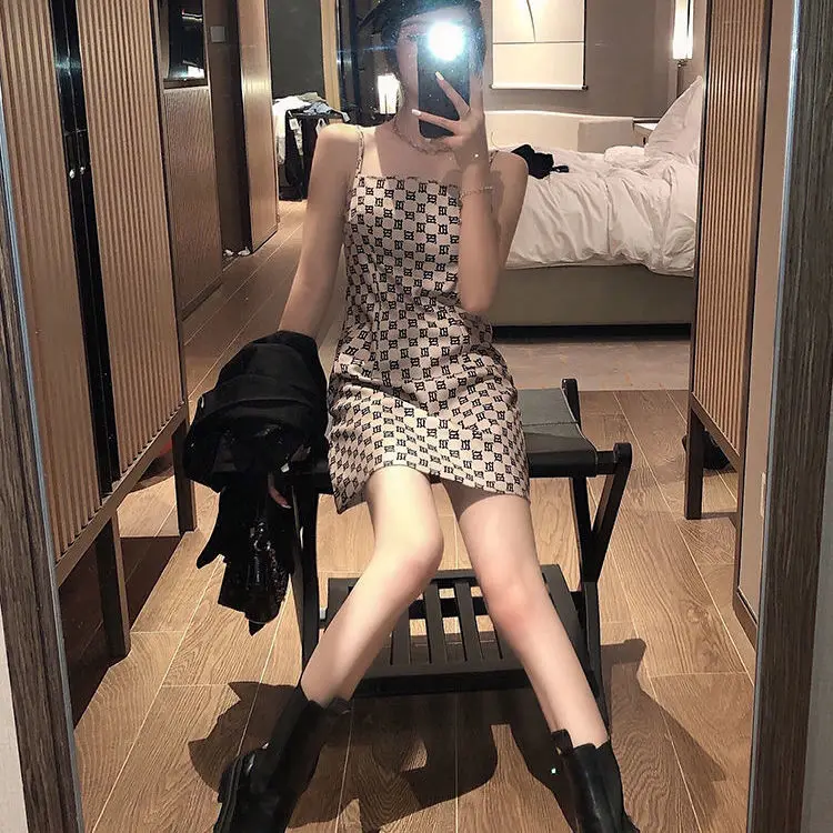 Net red plaid dress female summer 2021 summer new retro small fresh student suspender skirt slim slim short skirt