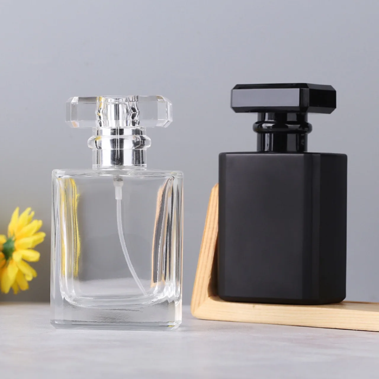 BESTSUN wholesale 30ml 50ml 100ml clear empty fragrance glass with pump spray lid perfume bottle square atomizer for cosmetic