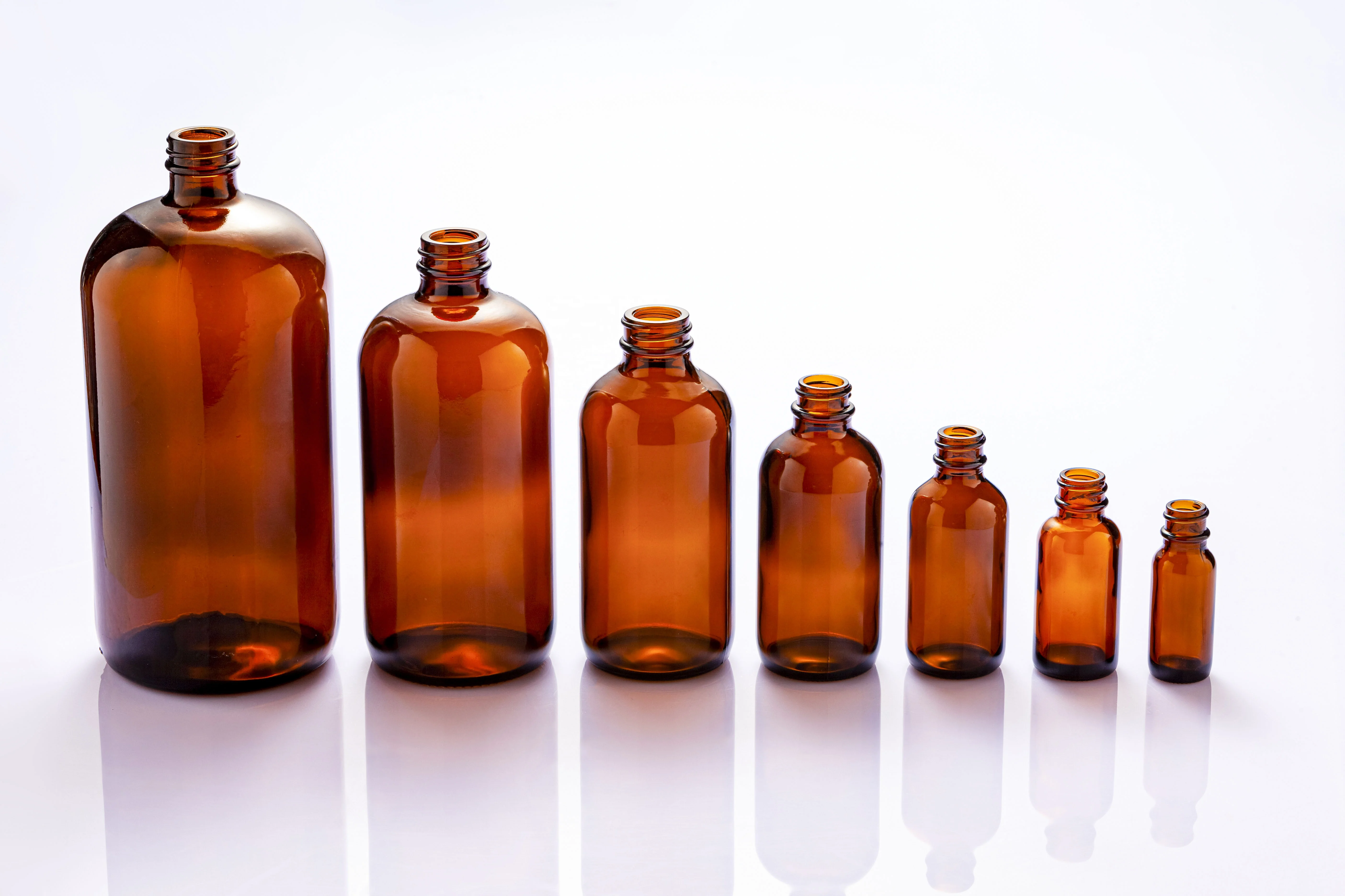 homay packing hot selling 0.5OZ-32OZ amber boston round glass bottle with plastic cap