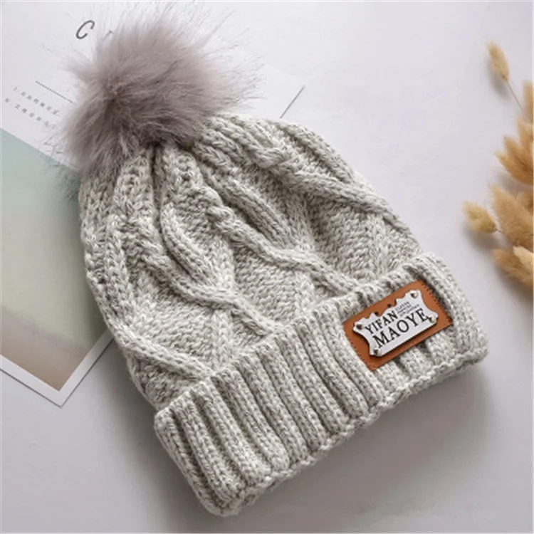 
Wholesale Winter Unisex Winter Blank Knitted Leather Label High Quality Pom Pom Beanie Hat 