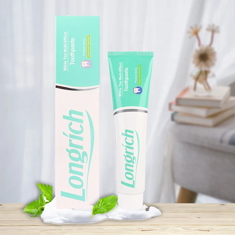 Low MOQ white tea toothpaste for teeth whitening removes stains oral care mint organic travel toothpaste