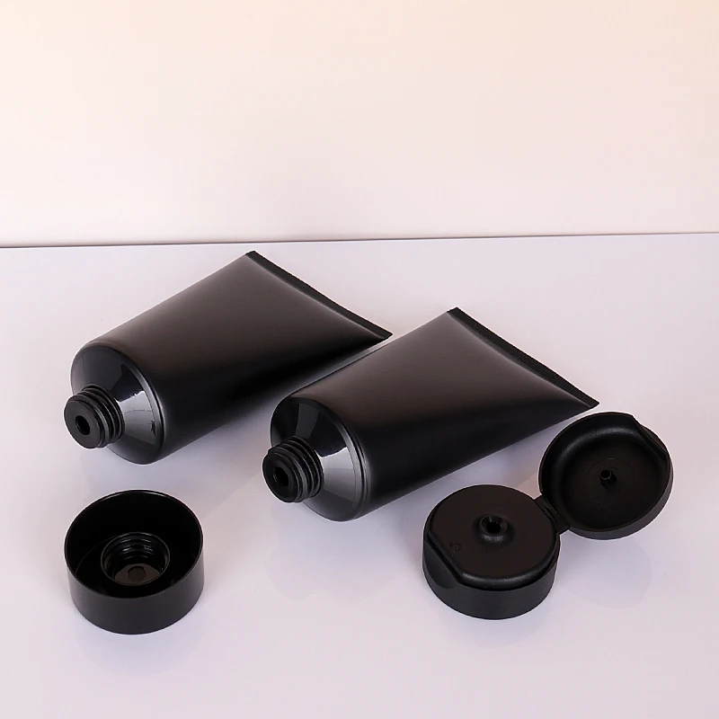 Custom logo matte black cosmetic plastic soft squeeze tube 100ml 150ml 200ml facial wash hand body cream bottle packaging