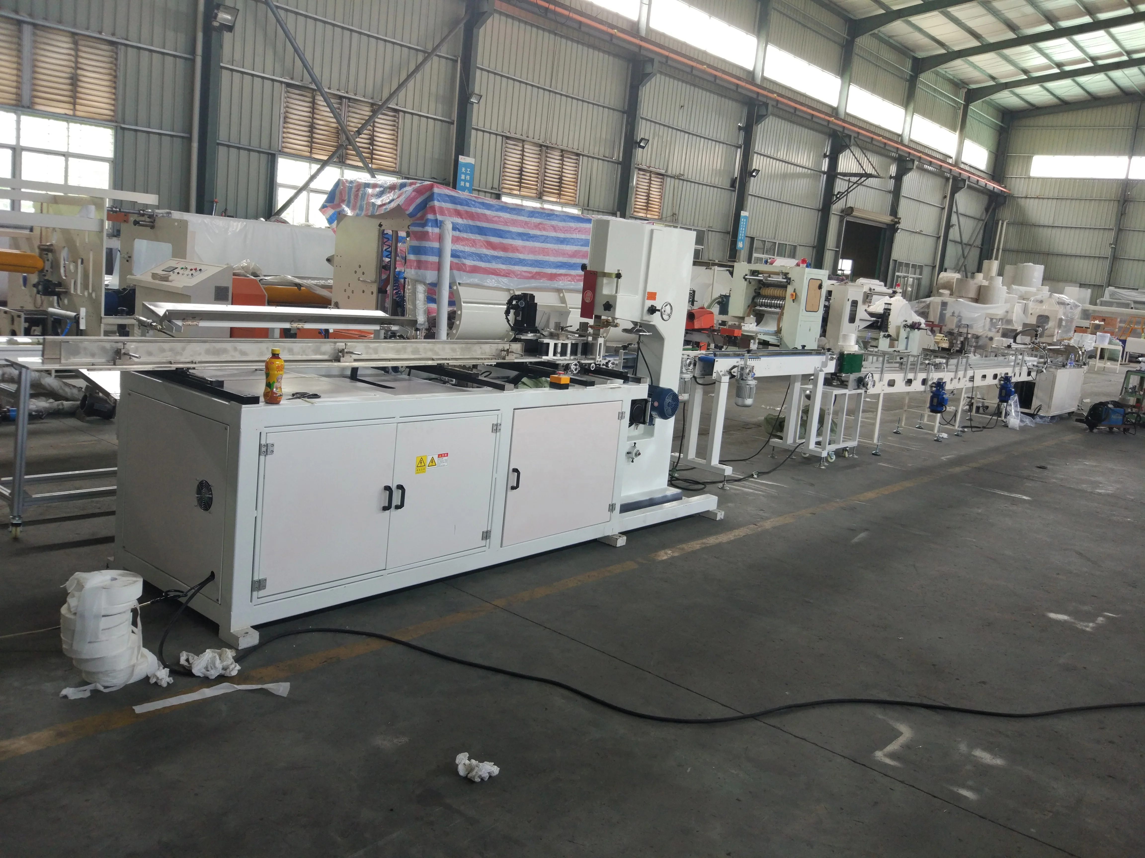China manufacturer color glue lamination kitchen towel production line color printing double embossing cutting packing machine
