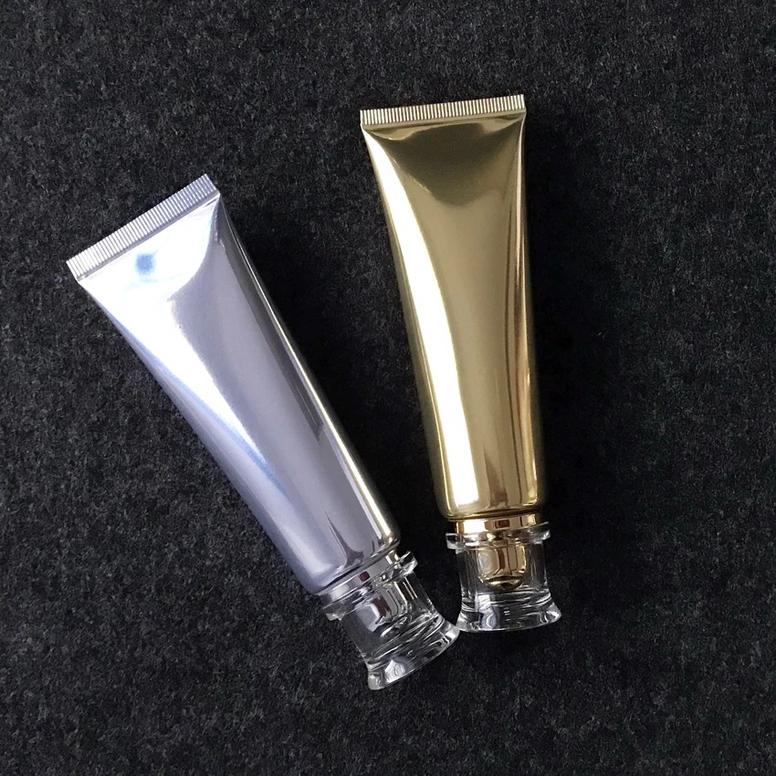luxury high quality 50ml 100ml shiny soft aluminum plastic tube silver/gold aluminum cream soft tube serum bottle with flip lid