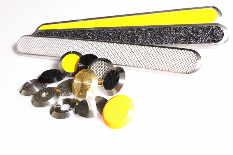 Stainless steel studs tactile paving textured surface for blind or visually impaired people at a pedestrian crossing