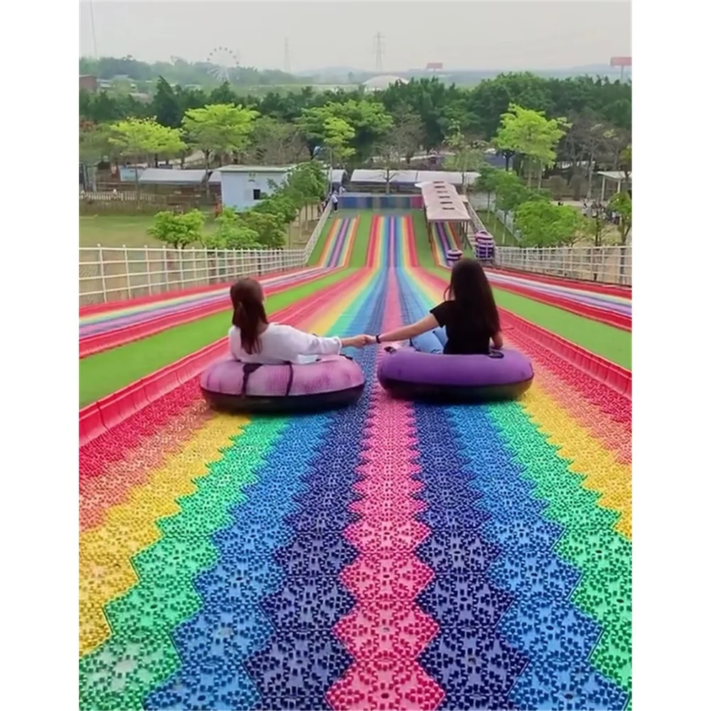 Commercial Rainbow Slide Artificial Ski Grass Turf Surface Donut Slide Ride Dry Slide Slope For Adult
