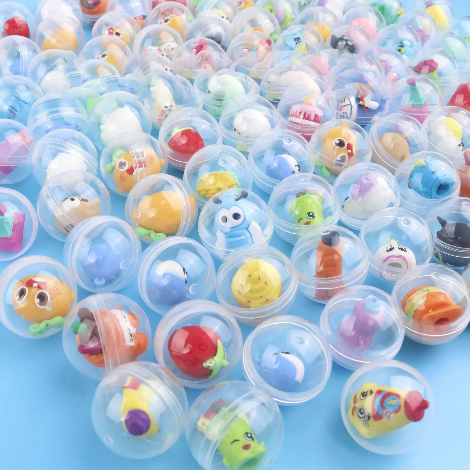 Capsule doll twisting machine toy candy machine egg twisting machine transparent plastic ball capsule toys