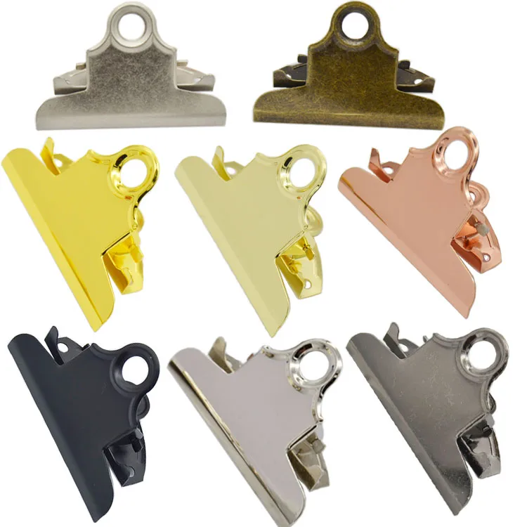 Factory manufacturers wholesale different styles and colors of metal lever clip hot bronze plate clip