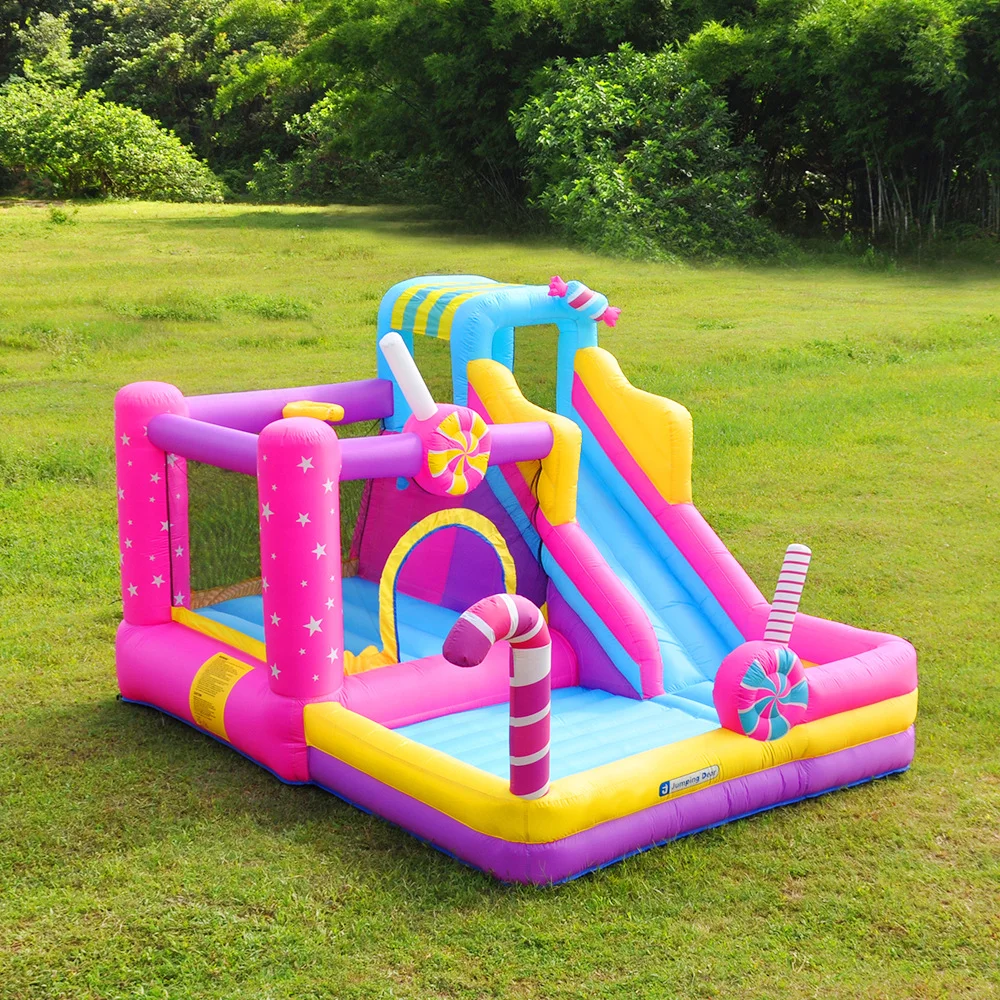 Inflatable bouncy house, climbing wall, jumps, water guns, splash pool for children in indoor & outdoor backyard.
