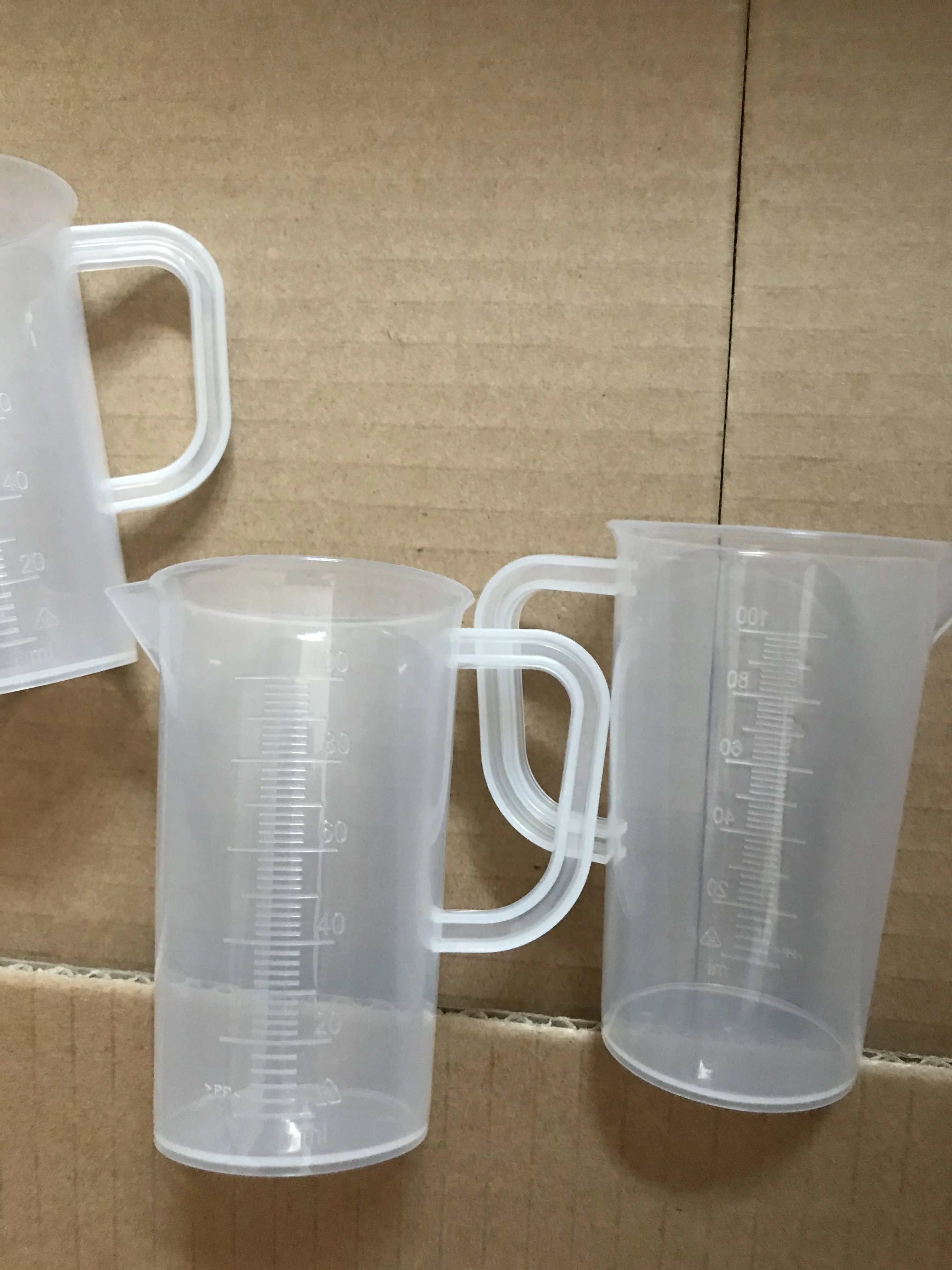 wholesale food grade 100ml small plastic measuring cup MCh100