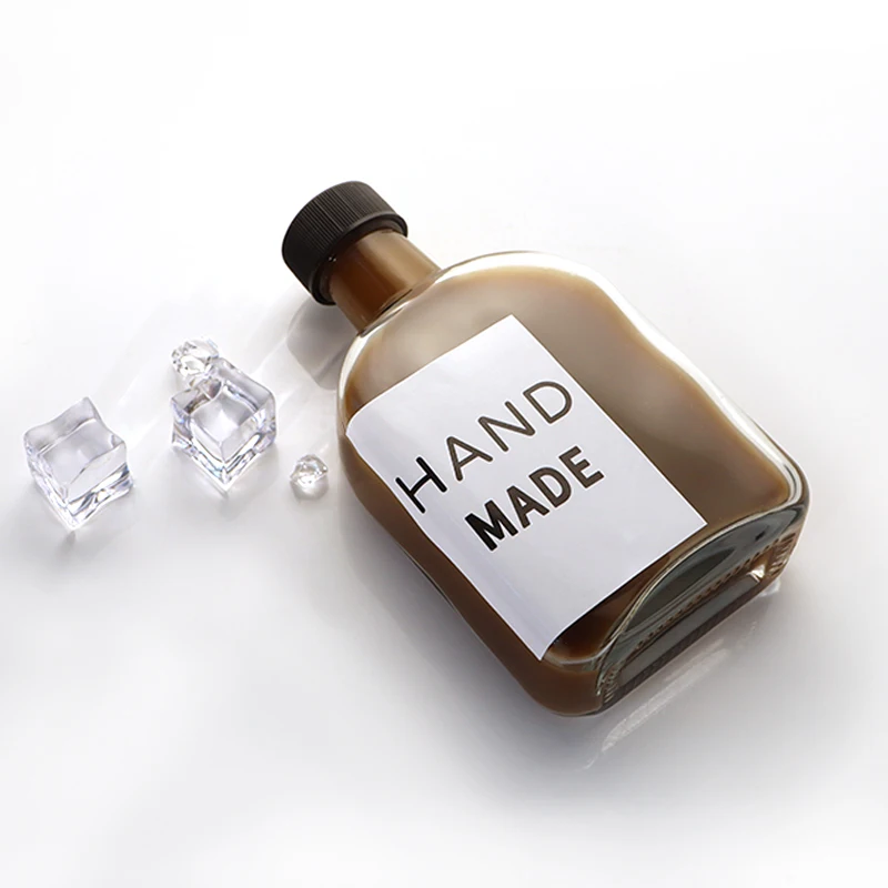 New Design 100ml 200ml 250ml 300ml Clear Beverage Packing Cold Brew Coffee Whisky Glass Bottles For Liquor Tea