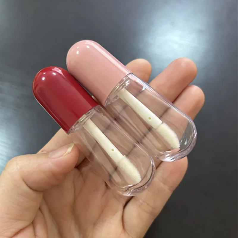 Hot sale pill shaped mini cute lipgloss tubes pink red custom logo empty lip gloss containers clear bottle with brush 4ml