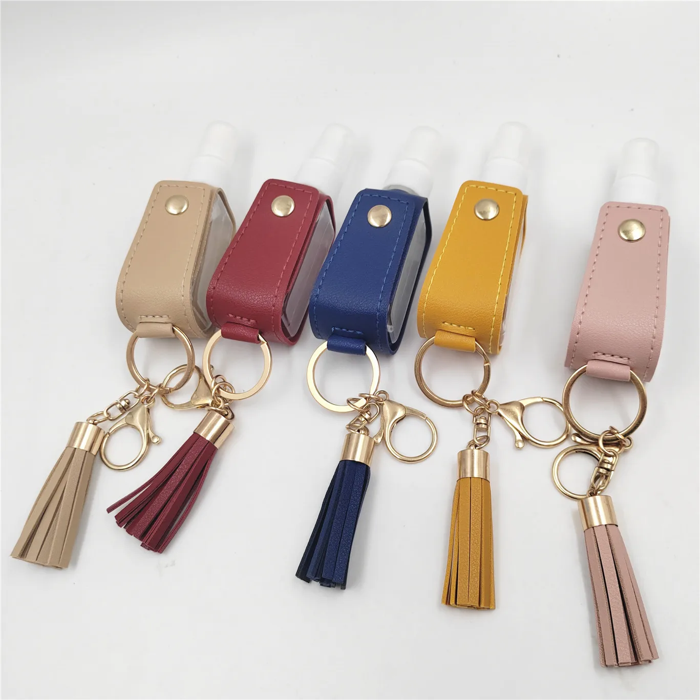 Pocket 30ml Mini Plastic Spray Hand Sanitizer Alcohol Pet Bottle with PU Leather Keychain Holder Plastic Bottle Manufacturer