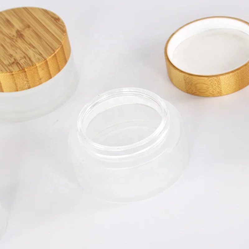 Eco friendly cosmetic packaging cosmetic glass jar with bamboo lid 100g glass cosmetic jar real bamboo