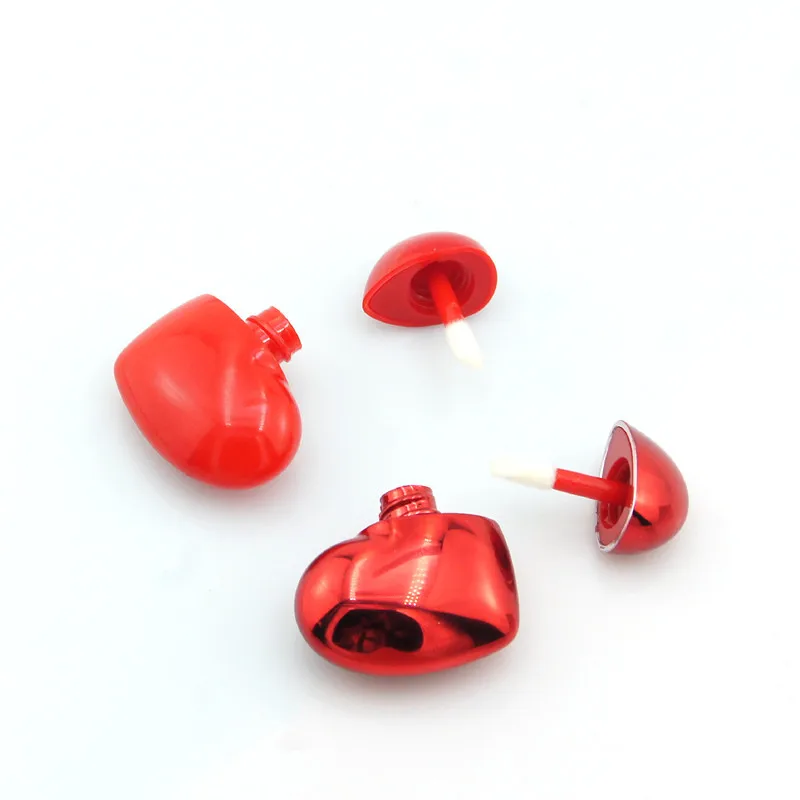 
The hot sale heart shaped high quality luxury and empty lip gloss squeeze tube container 