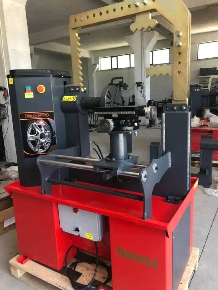 Машина для выпрямления обода zetмак с системой токарного станка синего цвета