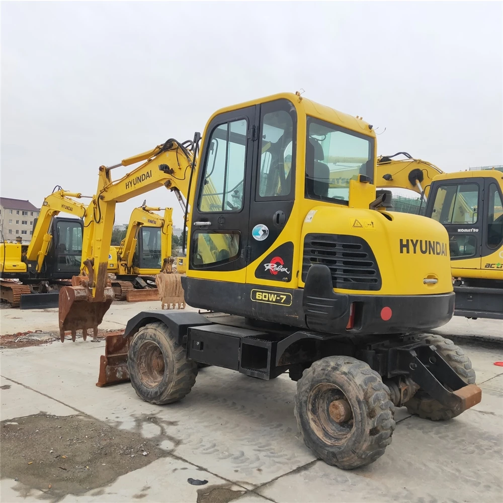 Б/у Hyundaii мини колесный экскаватор R60W-7 гидравлический машина малая конструкция ландшафтного дизайна машины 6 тонн Багер мини-экскаватор