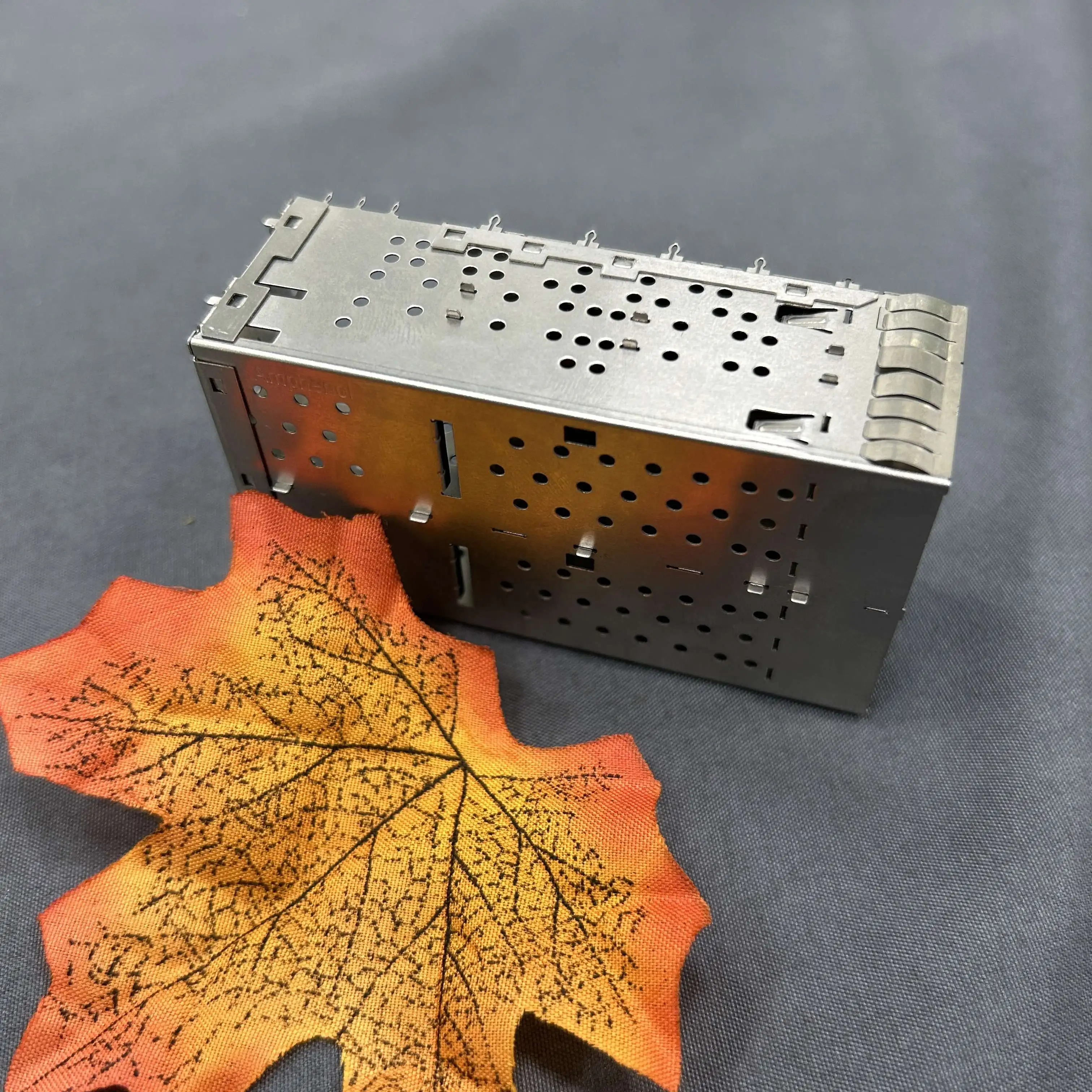 Optical fiber connector module shield cover The optical fiber module has a seat son shield Metal shield crimp pin connector