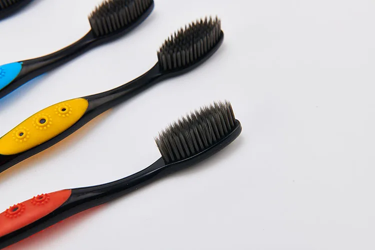 
OEM manufacturer cheap soft bristle plastic carbon toothbrush for adult 