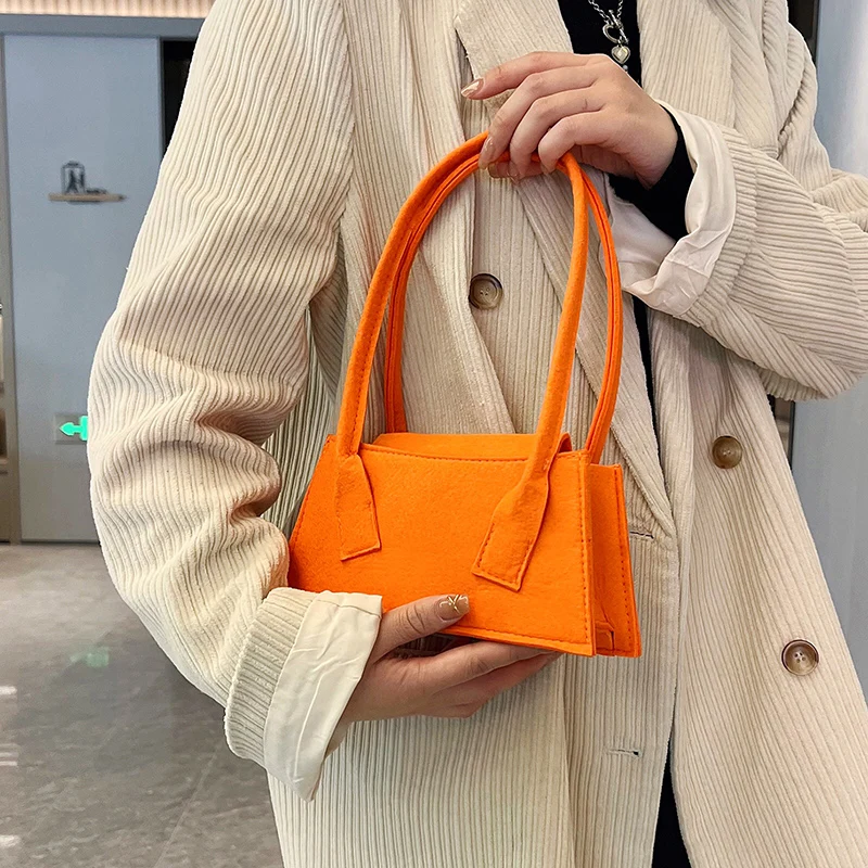 2023 new arrivals yiwu market products felt cloth bags China wholesale Fashion luxury handbag for women cheap flap dust bag