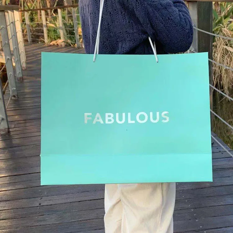 Hot Sale Customized logo Clothing paper bag with handle Luxury Custom paper gift bags with logo printing