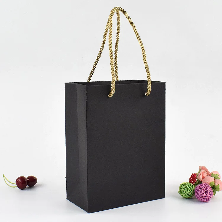 High quality custom logo printed rope handle paper bag paper shopper kraft clothes shopper with rope handle