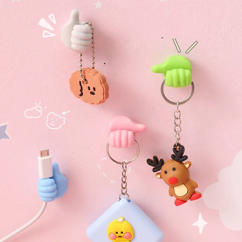 Factory Wholesale Thumb Wire Hook Creative Storage Three Finger Small Hand Hook Traceless Fixed Waterproof Hook