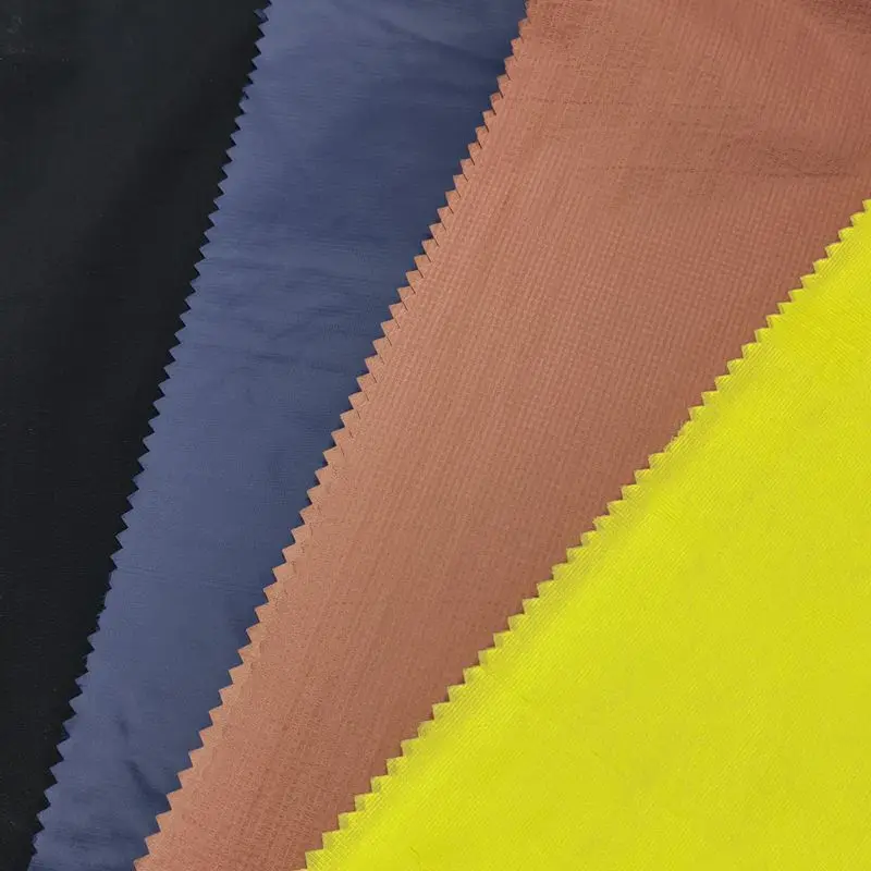Transparent Semi Dull 20D Nylon 380T Pongee Ripstop Fabric for Outdoor Jacket