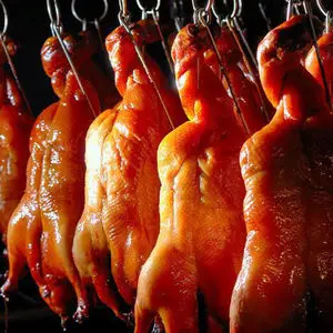 Лидер продаж заманчивая жареная утка в медовой глазури хрустящая кожа и ароматная готовая закуска традиционной китайской кухни
