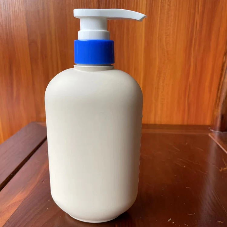 Wholesale custom 500ml plastic white HDPE round lotion bottle for shampoo body wash skin care packaging