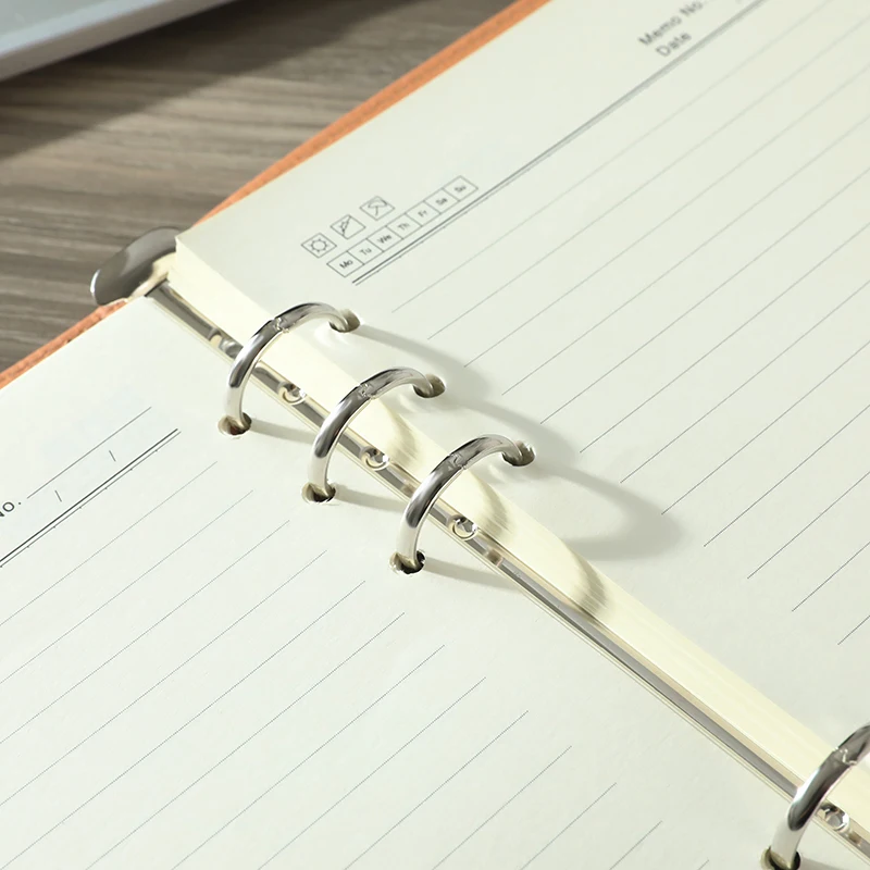 Factory sells luxury PU leather cover loose leaf hole clip notebook A5 in many colors with magnetic buckle