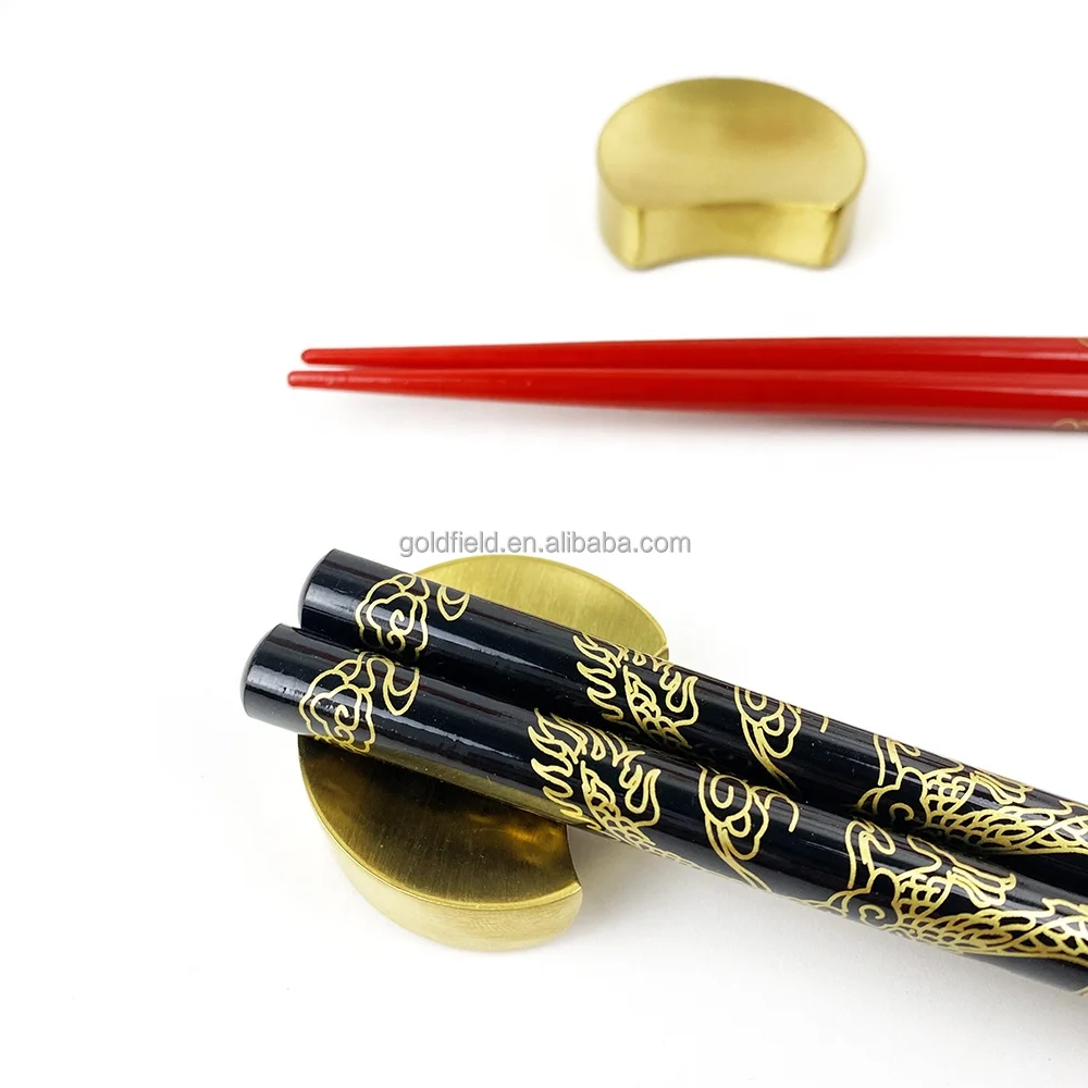 high-end golden dragon wood chopsticks with elegant golden moon stainless steel holders for restaurant
