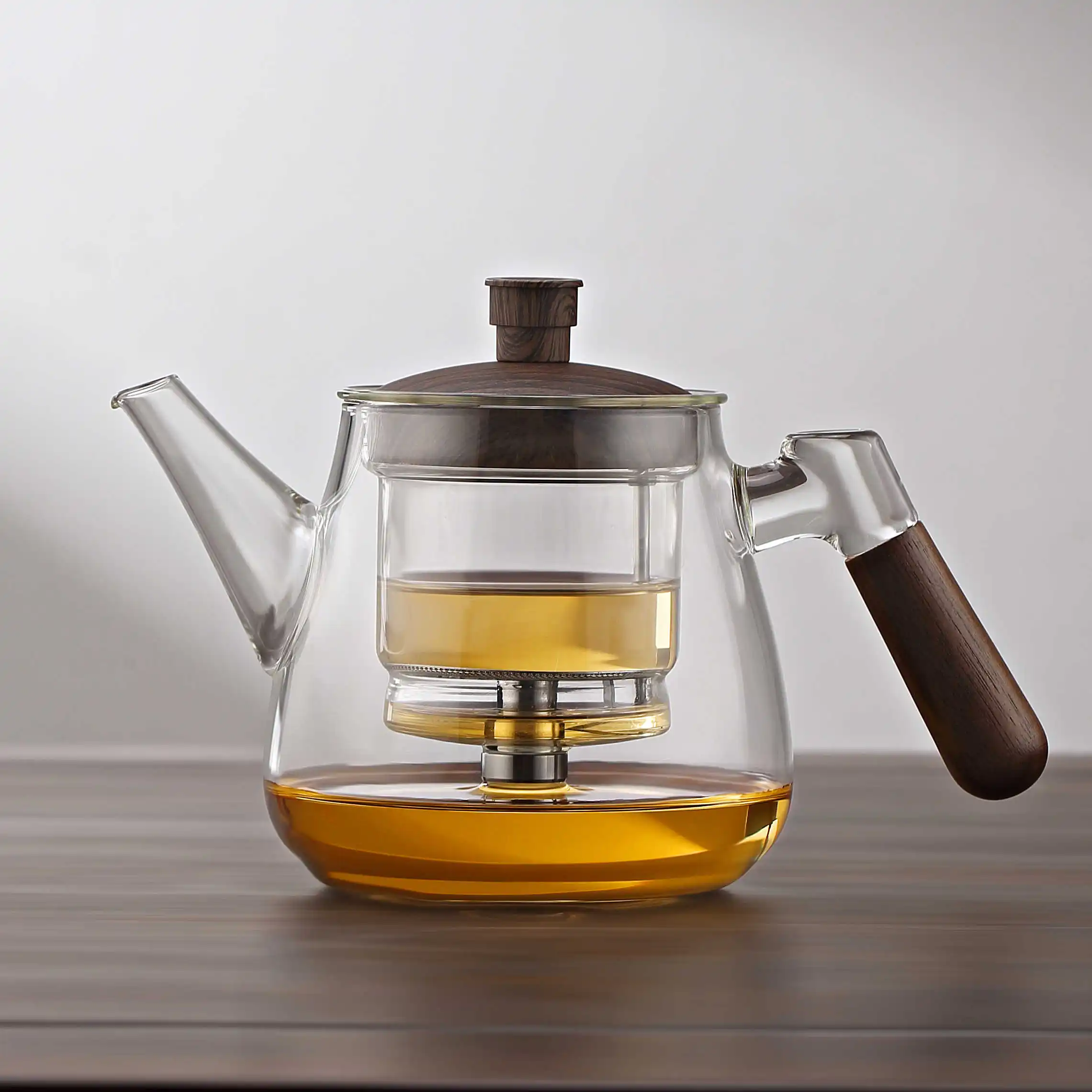 Wholesale thickened heat resistant glass teapot Transparent household flower teapot
