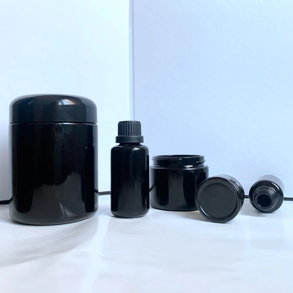 Wholesale Custom Round Airtight Glass UV Jars Uv Resistant Glass Jar with Bakelite Cap