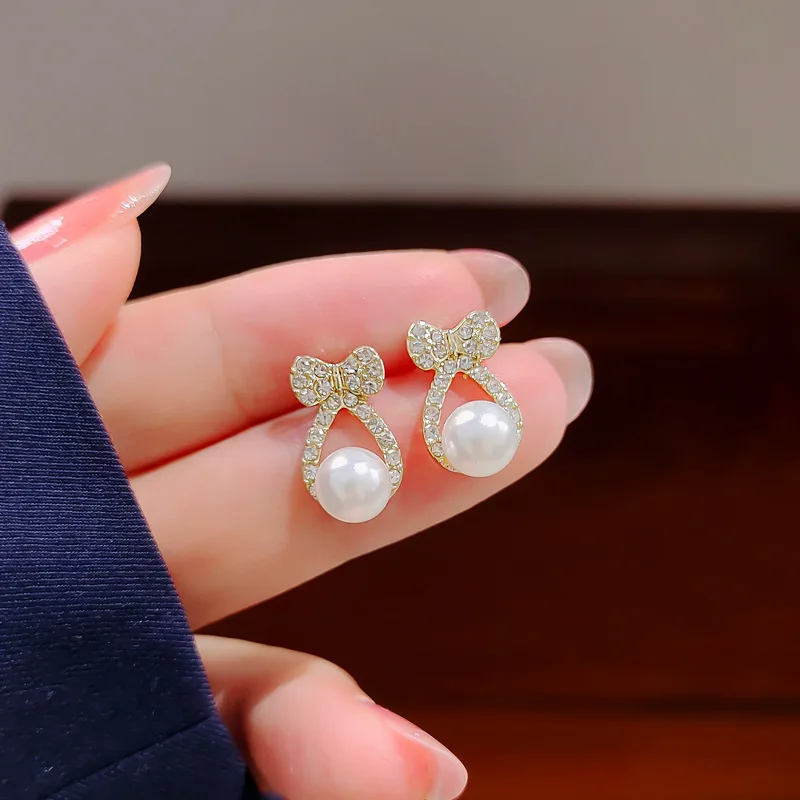 South Korea multi-match rhinestone pearl bowknot eardrop INS net red star earrings with female long temperament earpiece