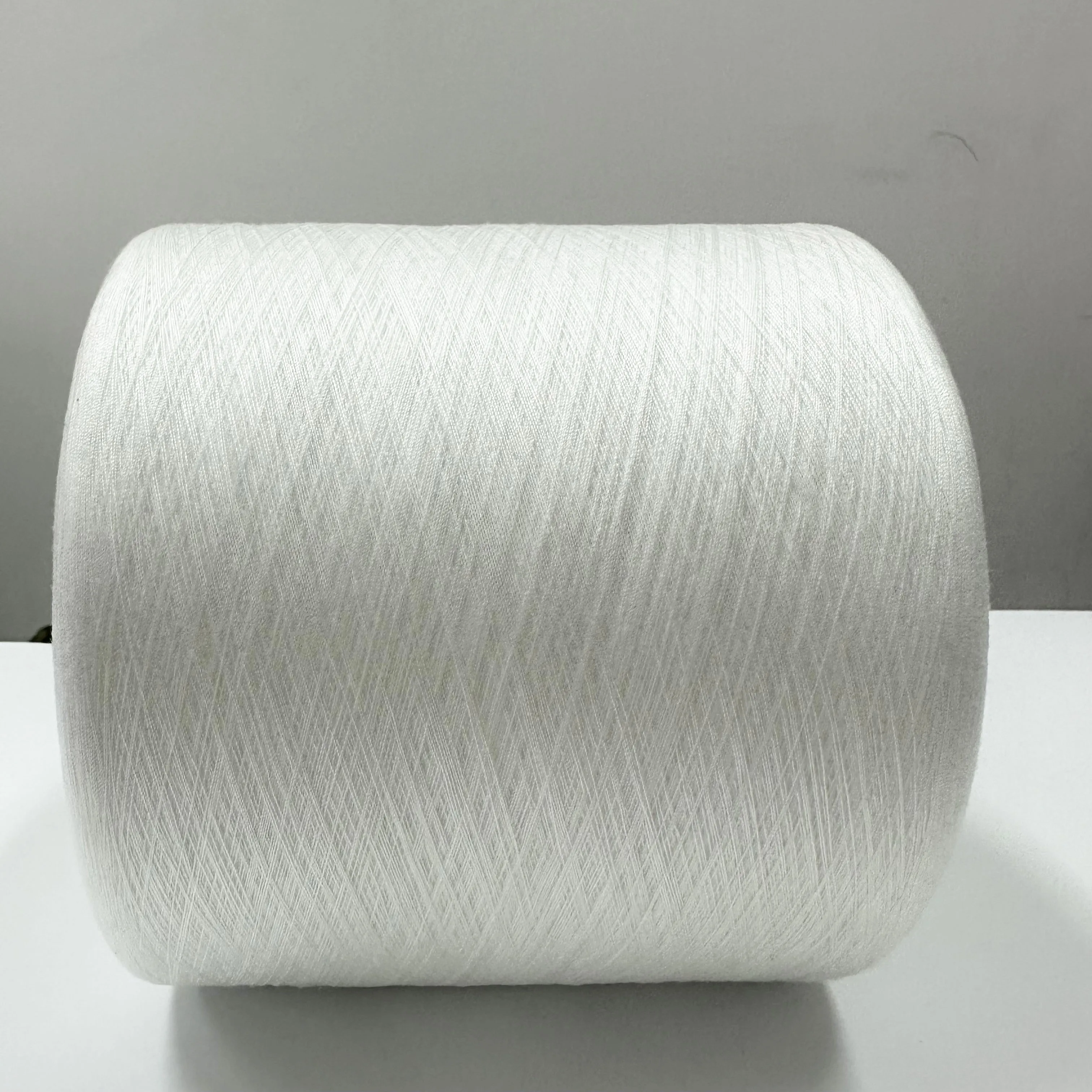 100% recycled polyester yarn raw white corespun durable sewing thread for denim