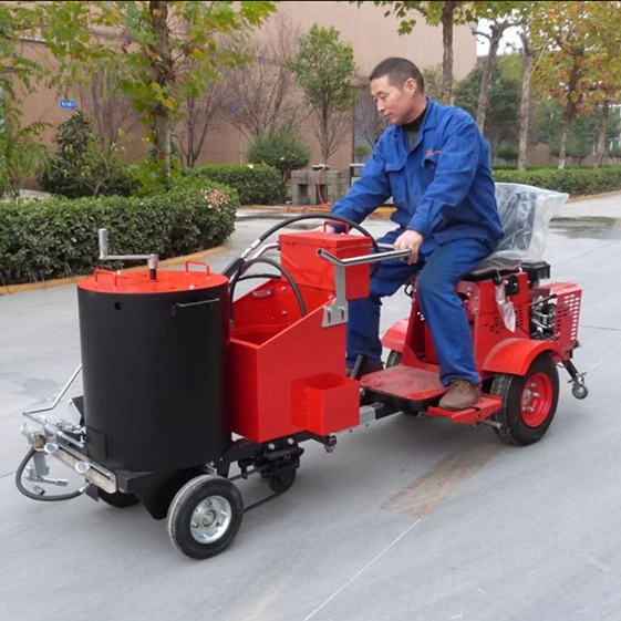 China thermoplastic vehicle driving type screeding road marking machine