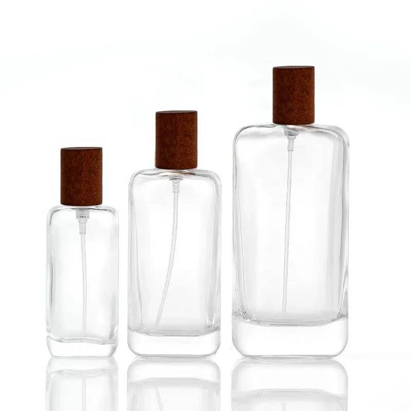 Custom 25ml 50ml 100ml clear glass spray pump perfume bottle with wooden cap