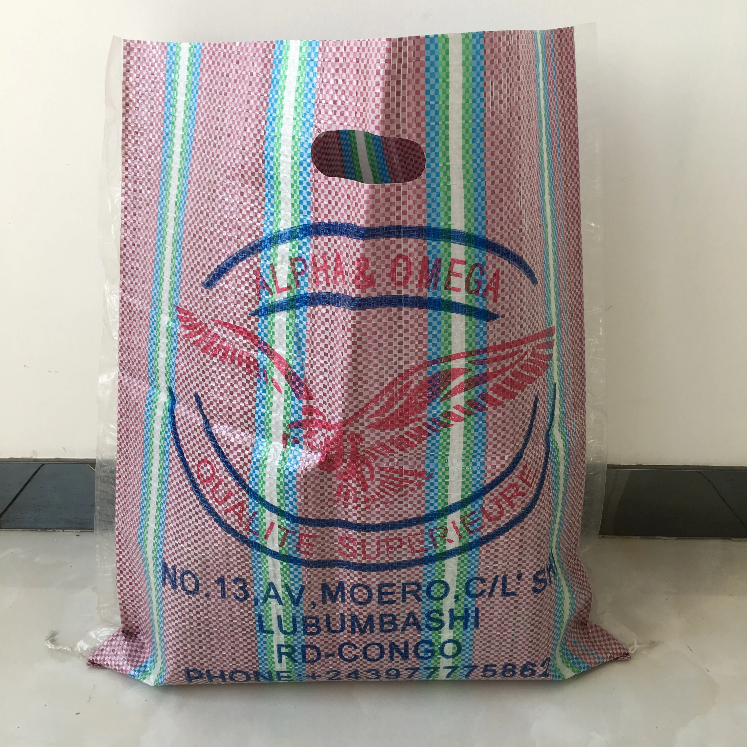 Peru foldable reusable colorful strip laminated pp woven punching handle shopping bag with custom logo and size